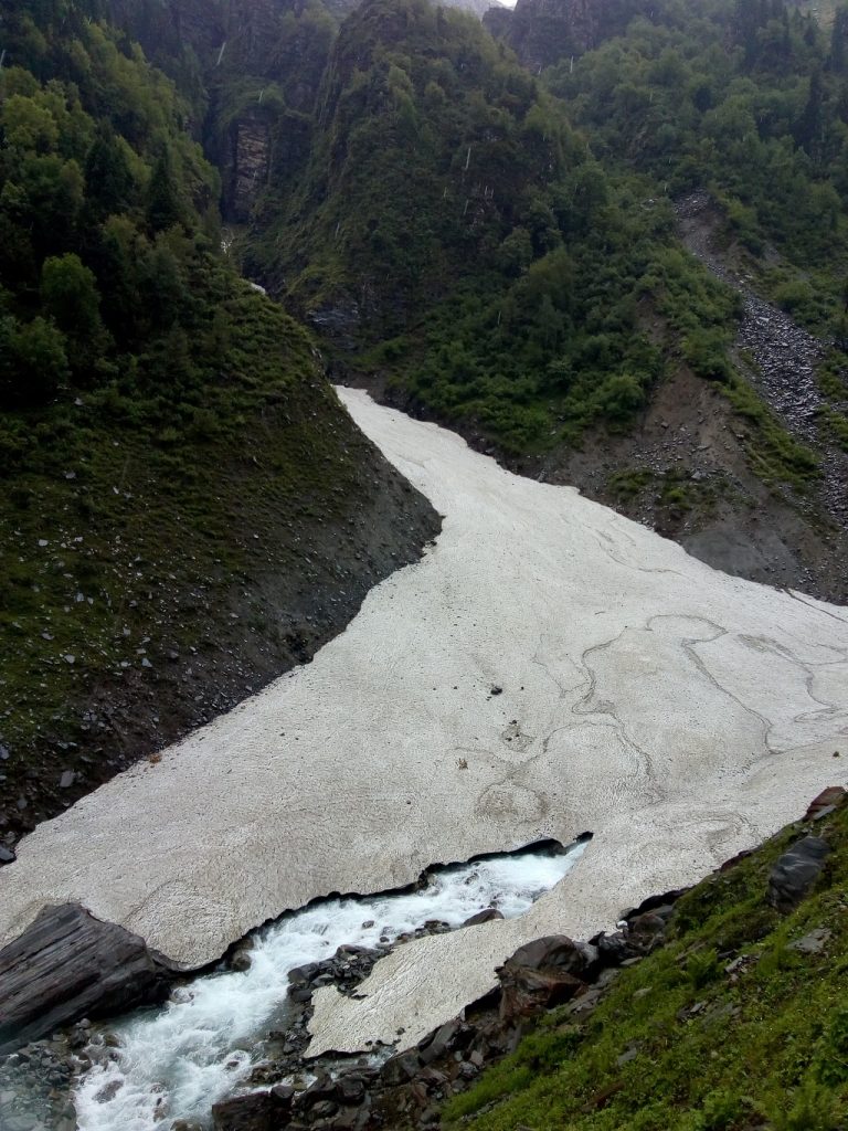 snow coverd river in rupin pass